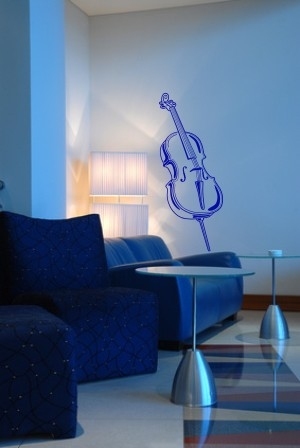 Naklejka wiolonczela na ścianie w salonie