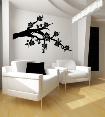 Naklejka gałązka na ścianę z kwiatkami