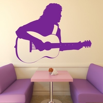 Naklejki na ścianę do klubu muzyk z gitarą