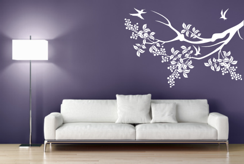 Naklejka ścienna biała gałązka z ptaszkami do dekoracji salonu.