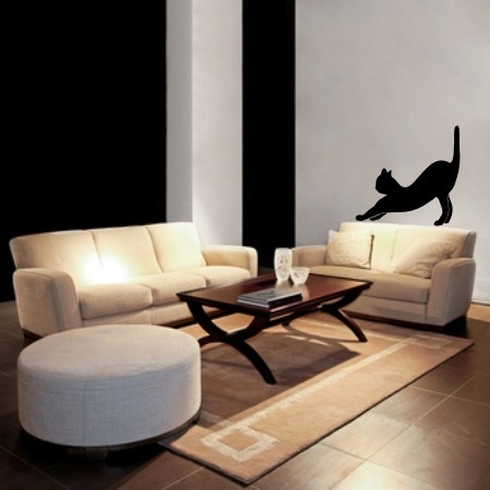 Naklejka kot na ścianie w salonie